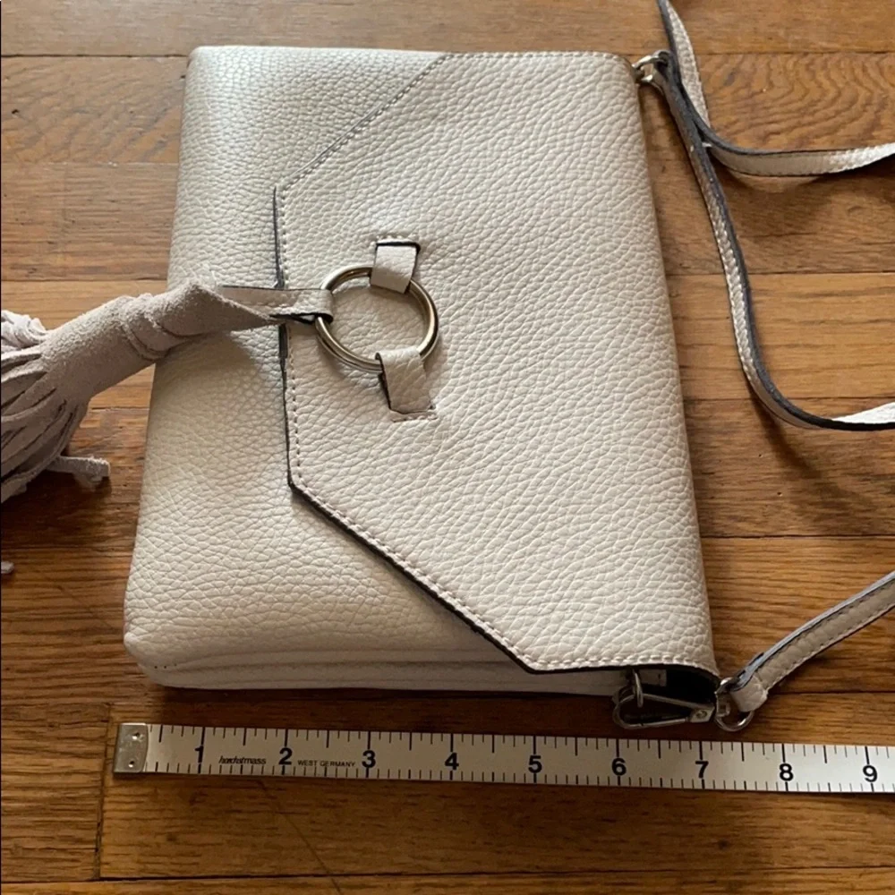White vegan leather crossbody purse with tassel
